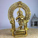 brass krishna idol
