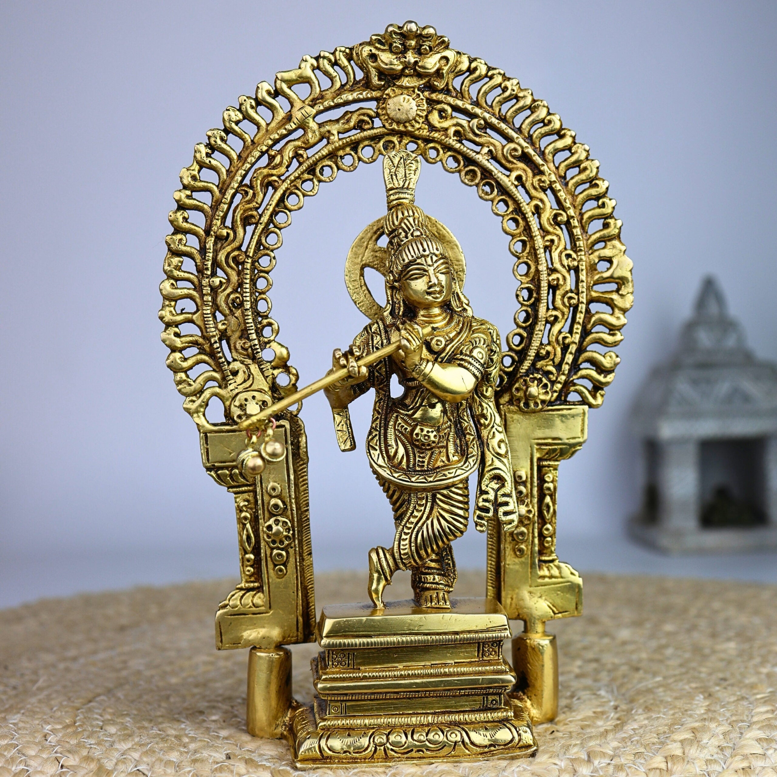 brass krishna idol