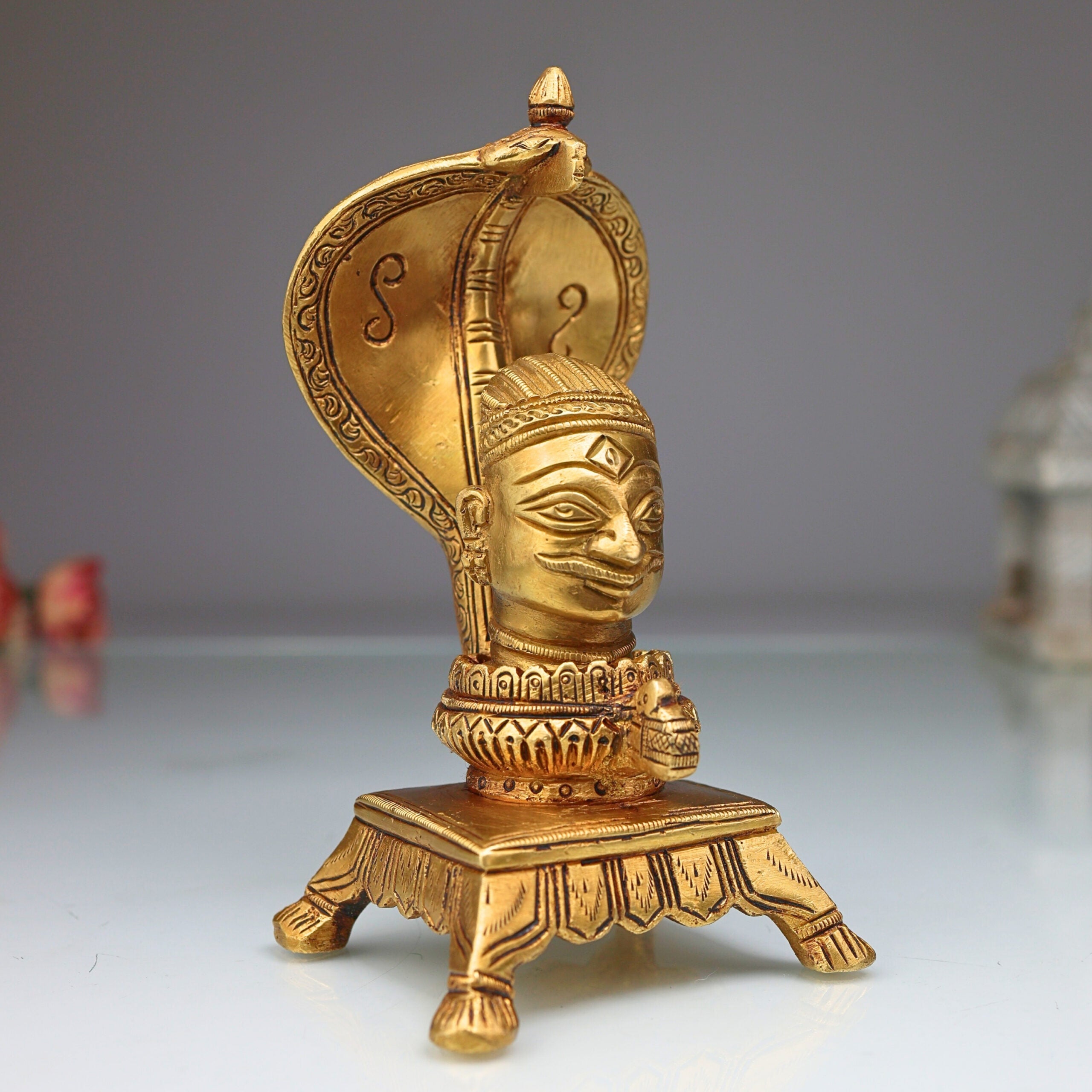Brass Shiva head with Sheshnag